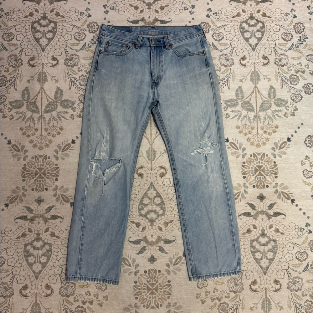 Levi’s 505 Light Wash Distressed Denim Jeans